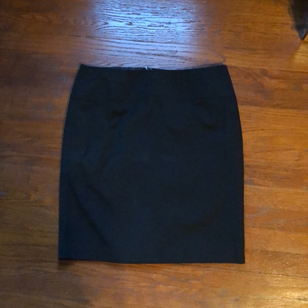a black skirt, with half zipper in back. worn once
